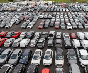 The image shows a large car fleet that is owned by a garage 