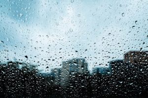 Rain on windows of a house